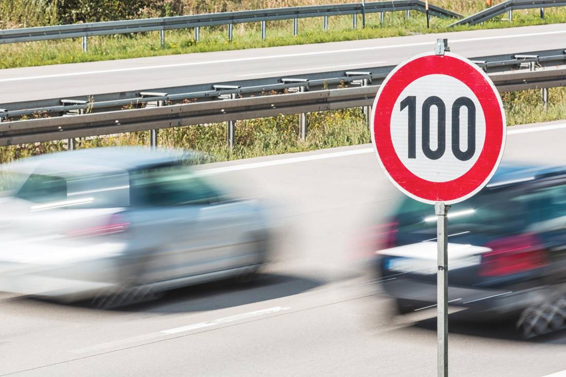 road sign speed limit cars